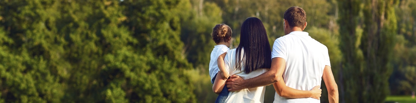 young family goes for a walk
